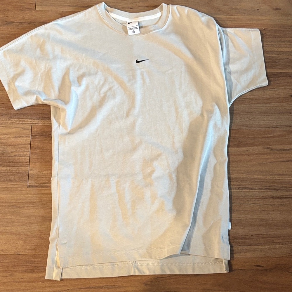 Nike woman’s  oversized Off-White Crewneck T-Shirt with Small Black Swoosh